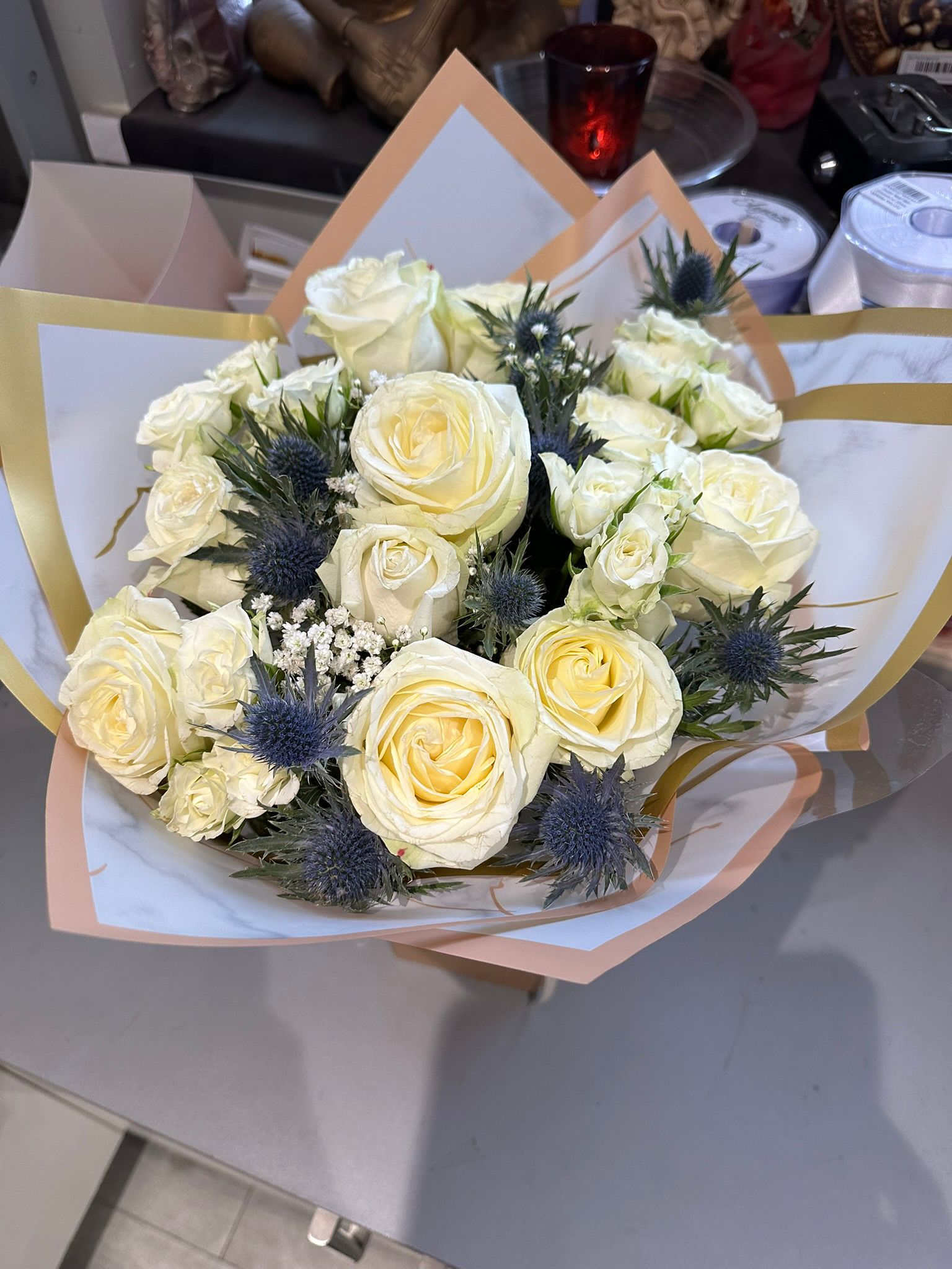 Cream Roses with Blue Thistle