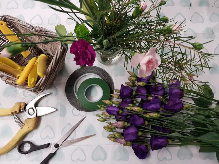 Authentic flower shop workspace with fresh arrangements